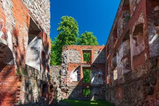 Ruins of old Grobina castle in summer day, Latvia.